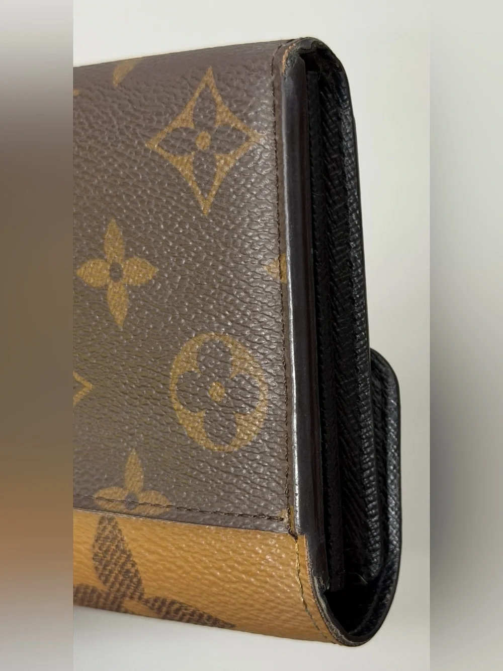 Louis Vuitton Sarah wallet in reverse monogram